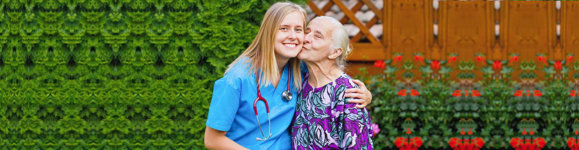 senior woman kissing a caregiver